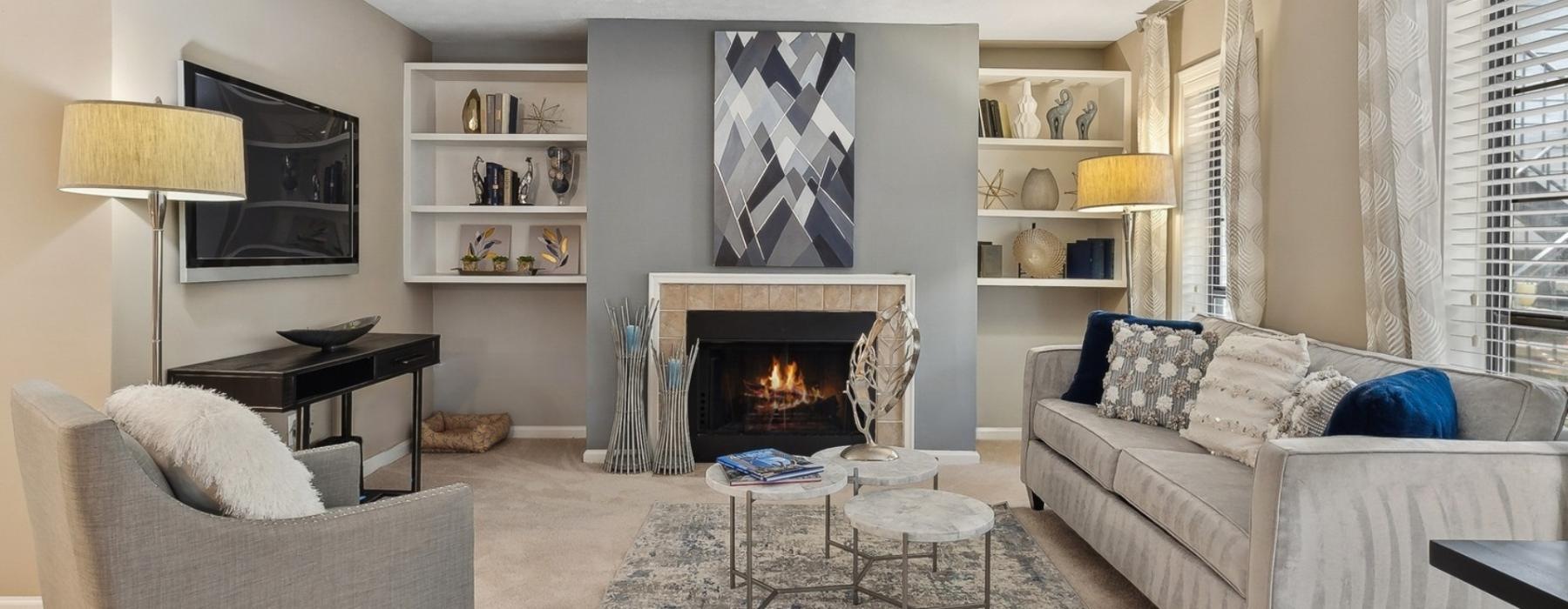 a living room with a fireplace