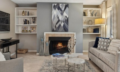 a living room with a fireplace