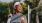 a person holding a tennis racket and a ball