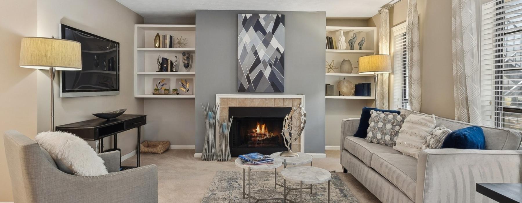 a living room with a fireplace